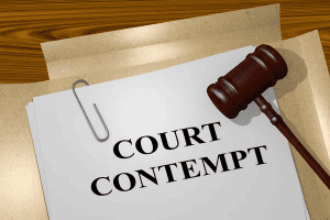 What are the consequences of contempt of court in child custody